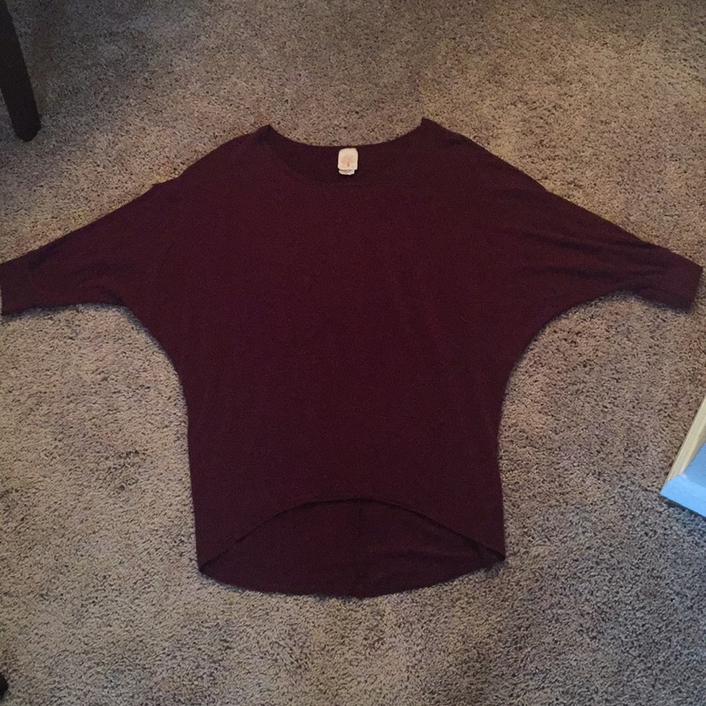 Maroon color top.